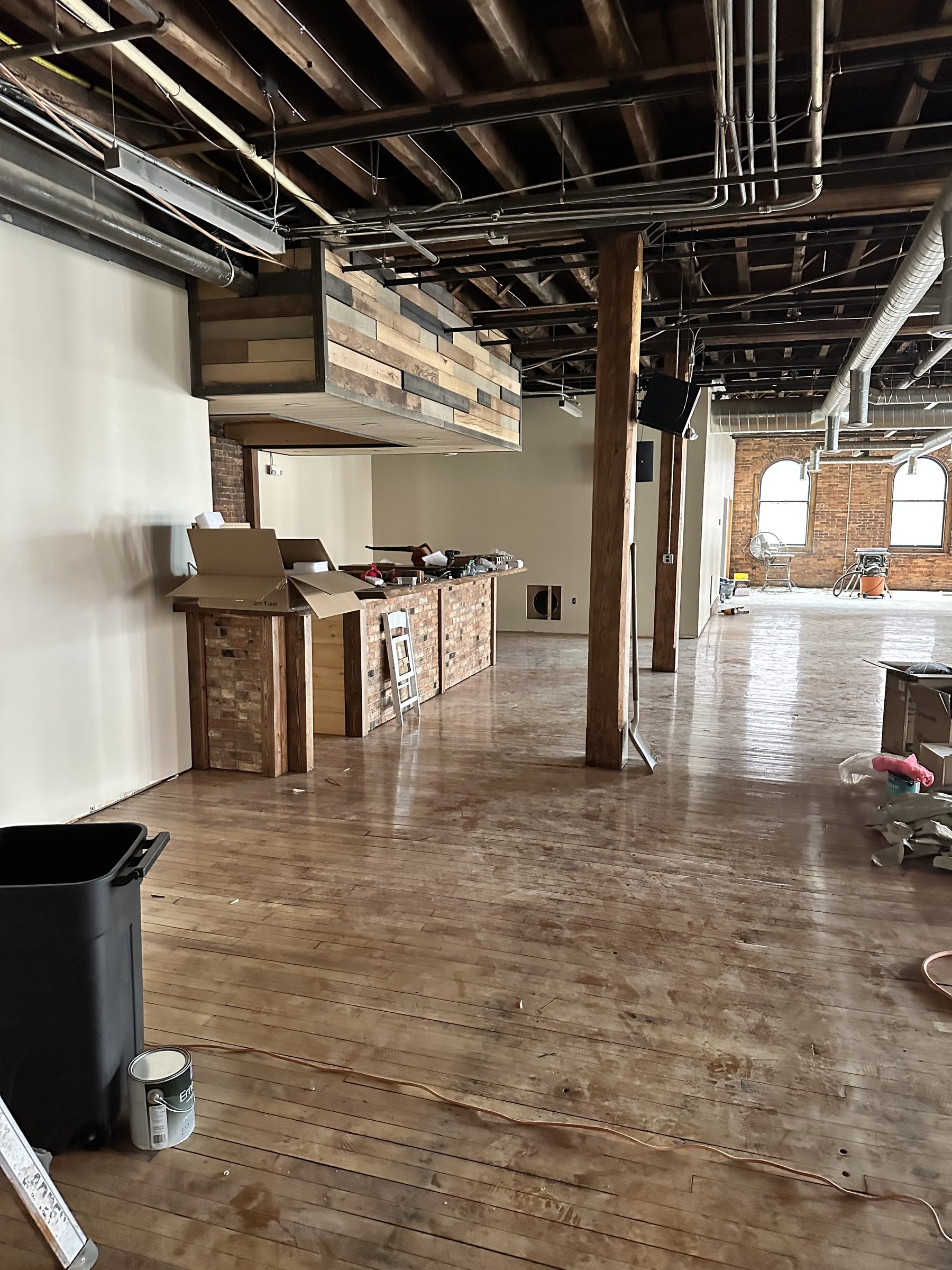From the bar toward the arched windows